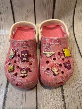 CROCS Kids size 4 Pink Hello Kitty Sanrio Clog Sandals with Charm Accents